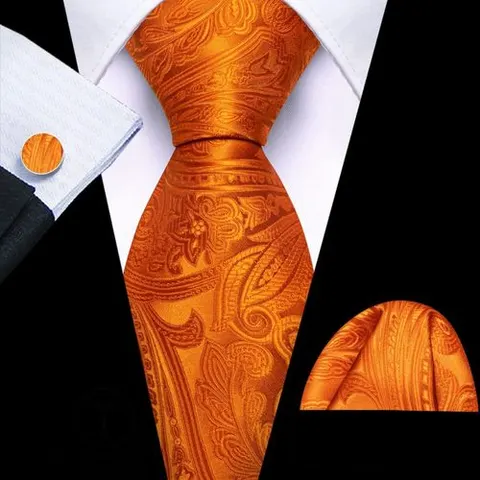 Paisley orange necktie with cufflinks and pocket square